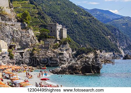 A beach viewpoint of Monterosso al Mare, the first village stop at Cinque Terre National Park; Monterosso al Mare, Liguria, Italy View Large Photo Image Stock Photograph - A beach viewpoint of Monterosso al Mare, the first village stop at Cinque Terre National Park; Monterosso al Mare, Liguria, Italy. Fotosearch