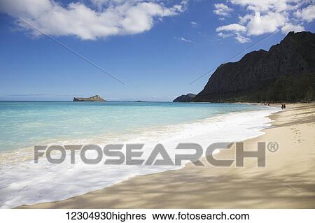 Stock Photograph - A beautiful day at the beach, Waimanalo Beach; Waimanalo, Oahu, Hawaii, United States of America. Fotosearch