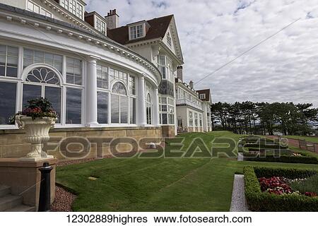 Stock Photograph - A building and it's gardens; Scotland. Fotosearch