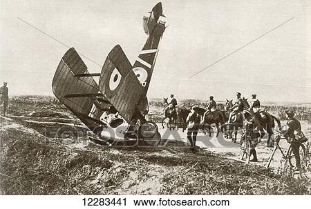Stock Image - A crashed aeroplane near Cherisy, France during World War One. From The Story of 25 Eventful Years in Pictures published 1935. Fotosearch