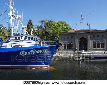 A fishing boat floats in a lock, Ballard Locks, Seattle, Washington, USA, Summer View Large Photo Image Stock Photograph - A fishing boat floats in a lock, Ballard Locks, Seattle, Washington, USA, Summer. Fotosearch