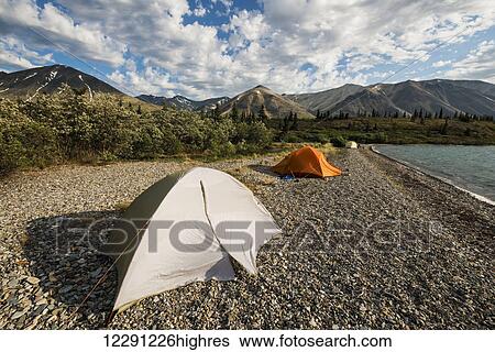 A group of tents sit on a beach in the Twin Lakes area of Lake Clark National Park & Preserve, Southcentral Alaska. View Large Photo Image Stock Photograph - A group of tents sit on a beach in the Twin Lakes area of Lake Clark National Park & Preserve, Southcentral Alaska.. Fotosearch