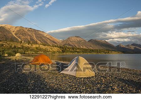 A group of tents sit on a beach in the Twin Lakes area of Lake Clark National Park & Preserve, Southcentral Alaska. View Large Photo Image Stock Photograph - A group of tents sit on a beach in the Twin Lakes area of Lake Clark National Park & Preserve, Southcentral Alaska.. Fotosearch
