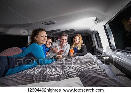 Stock Photograph - A group sleeps in a camper van; Kassel, Germany. Fotosearch