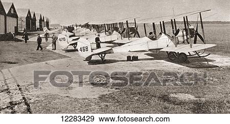 A line up of planes of the Royal Flying Corps which went into action in 1914. From The Story of 25 Eventful Years in Pictures published 1935 View Large Photo Image Stock Photo - A line up of planes of the Royal Flying Corps which went into action in 1914. From The Story of 25 Eventful Years in Pictures published 1935. Fotosearch