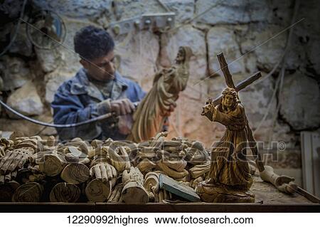 A man hand carves figurines; Bethlehem, Jerusalem View Large Photo Image Stock Photograph - A man hand carves figurines; Bethlehem, Jerusalem. Fotosearch