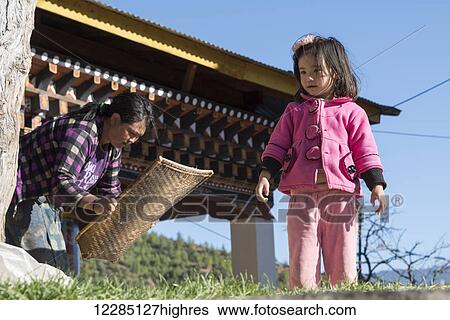 A mother and her young daughter; Paro, Bhutan View Large Photo Image Stock Photograph - A mother and her young daughter; Paro, Bhutan. Fotosearch