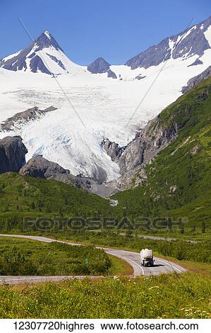 A pickup pulls a trailer down the Richardson Hwy with Worthington Glacier showing in background. Going north from Valdez, Alaska in Southcentral Alaska in Summer. View Large Photo Image Stock Photograph - A pickup pulls a trailer down the Richardson Hwy with Worthington Glacier showing in background. Going north from Valdez, Alaska in Southcentral Alaska in Summer.. Fotosearch