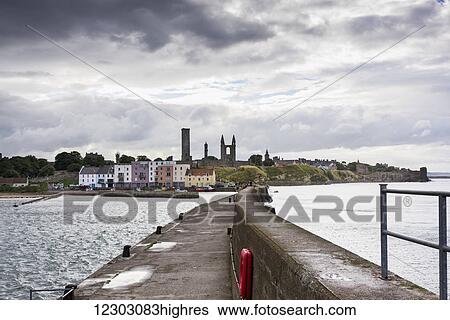 A pier and colourful buildings along the harbour; St. Andrews, Fife, Scotland View Large Photo Image Stock Photograph - A pier and colourful buildings along the harbour; St. Andrews, Fife, Scotland. Fotosearch