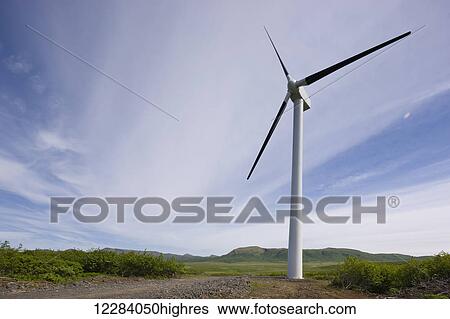 Stock Photograph - A single wind turbine, Sand Point, Southwestern Alaska, USA, Summer. Fotosearch