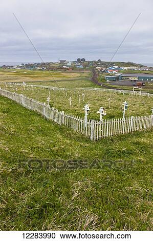 A weathered picket fence surrounds the grave crosses in the cemetary outside St. Paul, St. Paul Island, Southwestern Alaska, USA, Summer View Large Photo Image Stock Image - A weathered picket fence surrounds the grave crosses in the cemetary outside St. Paul, St. Paul Island, Southwestern Alaska, USA, Summer. Fotosearch
