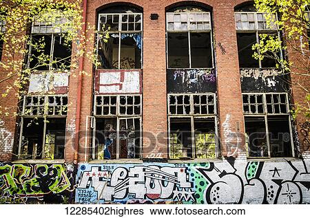 Stock Photograph - Abandoned building covered in graffiti; Stockholm, Sweden. Fotosearch