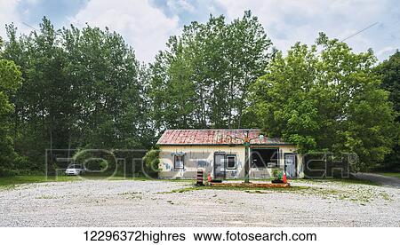 Stock Photograph - Abandoned gasoline station in rural Southern Ontario; Brooksdale, Ontario, Canada. Fotosearch
