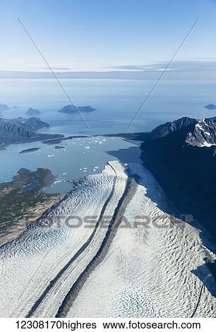 Stock Photograph - Aerial view of Bear Glacier and lagoon in summer, Resurrection Bay, Seward, Kenai Peninsula, Southcentral Alaska, USA. Fotosearch