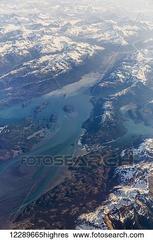 Aerial view of Cordova and Orca Inlet with the Chugach Mountains in the background, Cordova, Southeast Alaska, USA, Summer View Large Photo Image Stock Photograph - Aerial view of Cordova and Orca Inlet with the Chugach Mountains in the background, Cordova, Southeast Alaska, USA, Summer. Fotosearch