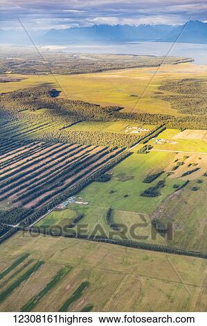Aerial view of farm land in the Matanuska-Susitna Valley near Point MacKenzie, Wasilla, Southcentral Alaska, USA View Large Photo Image Stock Photograph - Aerial view of farm land in the Matanuska-Susitna Valley near Point MacKenzie, Wasilla, Southcentral Alaska, USA. Fotosearch