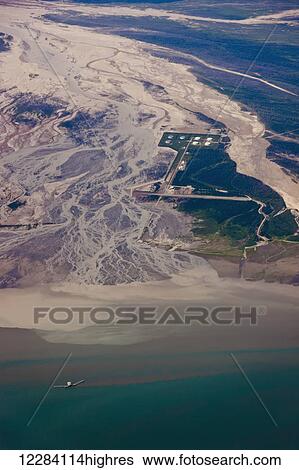 Stock Photograph - Aerial view of the Drift River Oil Storage Facility, Drift River, Southcentral Alaska, USA, Summer. Fotosearch