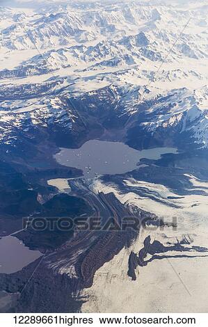 Stock Photograph - Aerial view of the Malaspina Lake and Glacier in the Coastal Range, Southeast Alaska, USA, Summer. Fotosearch