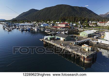 Aerial view of the pier at the Sitka Harbor with fishing Boats docked in the background, Sitka, Southeast Alaska, USA, Summer View Large Photo Image Stock Photograph - Aerial view of the pier at the Sitka Harbor with fishing Boats docked in the background, Sitka, Southeast Alaska, USA, Summer. Fotosearch