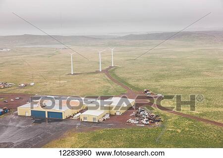 Aerial view of the St. Paul Airport and three wind turbines in the background, red dirt roads connecting the infrastructure, St. Paul Island, Southwestern Alaska, USA, Summer View Large Photo Image Stock Image - Aerial view of the St. Paul Airport and three wind turbines in the background, red dirt roads connecting the infrastructure, St. Paul Island, Southwestern Alaska, USA, Summer. Fotosearch