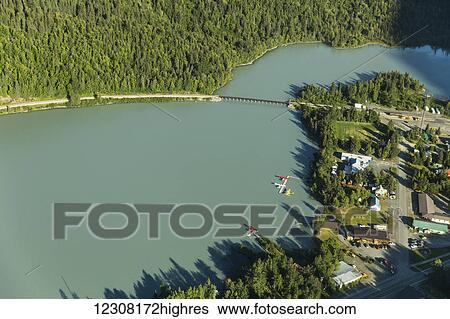 Stock Photograph - Aerial view of the Trail Lake Alaska Railroad Tressel and Float Plane Base, Moose Pass, Kenai Peninsula, Southcentral Alaska, USA. Fotosearch