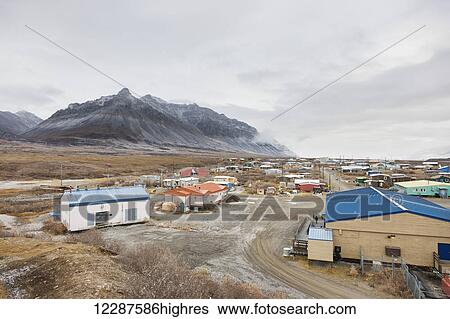 Stock Photograph - Aerial view of the village of Anatuvuk Pass, Brooks Range, Arctic Alaska, USA, Winter. Fotosearch