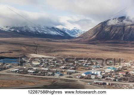 Stock Photograph - Aerial view of the village of Anatuvuk Pass, Brooks Range, Arctic Alaska, USA, Winter. Fotosearch