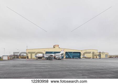 Airport on St. Paul, A turbo propeller airplane in the foreground, St. Paul Island, Southwestern Alaska, USA, Summer View Large Photo Image Stock Photo - Airport on St. Paul, A turbo propeller airplane in the foreground, St. Paul Island, Southwestern Alaska, USA, Summer. Fotosearch
