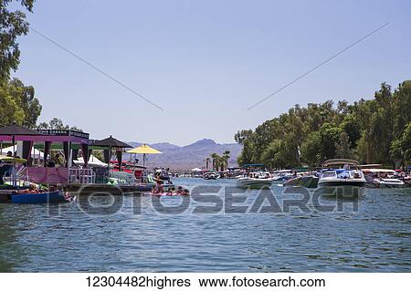 Stock Photograph - An afternoon boating on the Lake Havasu River; Lake Havasu City, Arizona, United States of America. Fotosearch