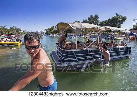 Stock Photograph - An afternoon boating on the Lake Havasu River; Lake Havasu City, Arizona, United States of America. Fotosearch