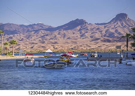 Stock Photograph - An afternoon boating on the Lake Havasu River; Lake Havasu City, Arizona, United States of America. Fotosearch