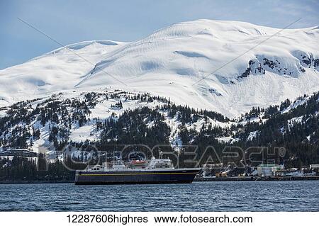 An Alaska Marine Highway ferry arrives at the Whittier harbor in the winter, Prince William Sound, Southcentral Alaska, USA, Winter View Large Photo Image Stock Photograph - An Alaska Marine Highway ferry arrives at the Whittier harbor in the winter, Prince William Sound, Southcentral Alaska, USA, Winter. Fotosearch
