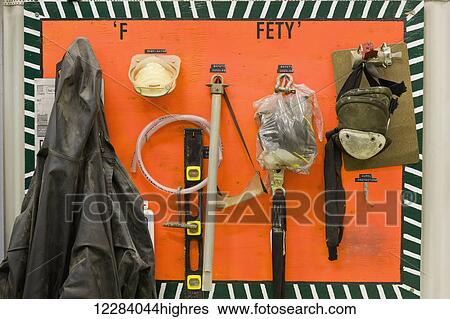 An electrical worker's tools and gear hang on a wall inside an electrical power plant, Sand Point, Southwestern Alaska, USA, Summer View Large Photo Image Stock Photograph - An electrical worker's tools and gear hang on a wall inside an electrical power plant, Sand Point, Southwestern Alaska, USA, Summer. Fotosearch
