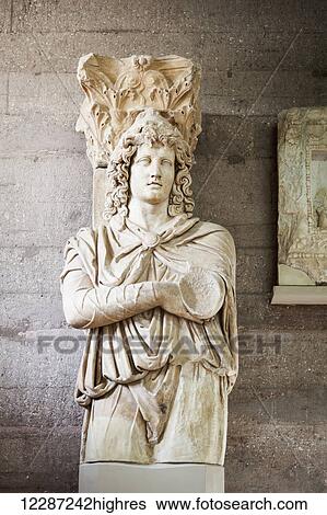 Stock Photograph - Ancient statue at an archaeological museum; Corinth, Greece. Fotosearch