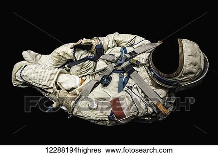 Astronaut floating on a black background; Milan, Lombardy, Italy View Large Photo Image Stock Photograph - Astronaut floating on a black background; Milan, Lombardy, Italy. Fotosearch