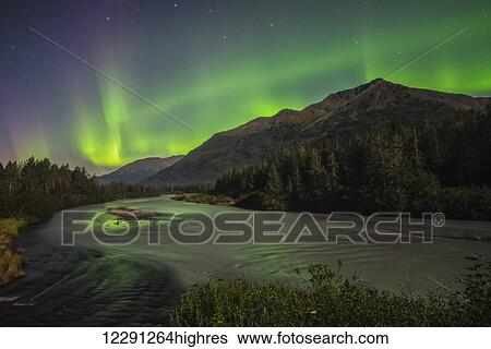 Aurora borealis over Portage Creek in Chugach National Forest, Alaska. View Large Photo Image Stock Photograph - Aurora borealis over Portage Creek in Chugach National Forest, Alaska.. Fotosearch