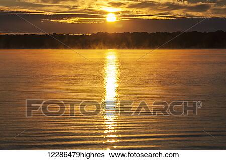 Stock Photograph - Balsam Lake at sunrise; Ontario, Canada. Fotosearch