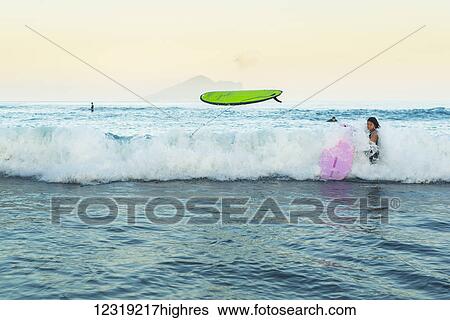 Beginner surfers suffering from the strength of the ocean, Waiao beach, Yilan County; Taiwan, China View Large Photo Image Stock Photograph - Beginner surfers suffering from the strength of the ocean, Waiao beach, Yilan County; Taiwan, China. Fotosearch