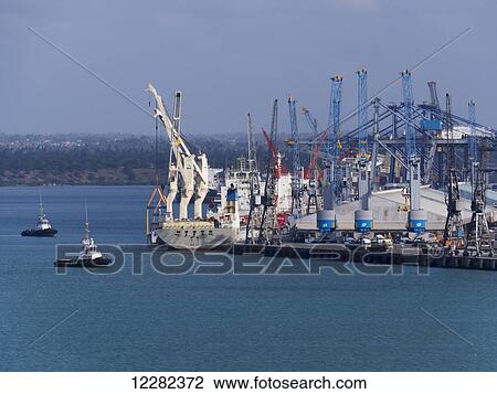 Boats and cranes at the port; Dar es Salaam, Tanzania View Large Photo Image Stock Image - Boats and cranes at the port; Dar es Salaam, Tanzania. Fotosearch