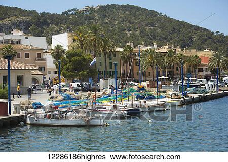 Stock Photograph - Boats at the harbour to Favignana; Trapani Province, Sicily. Fotosearch
