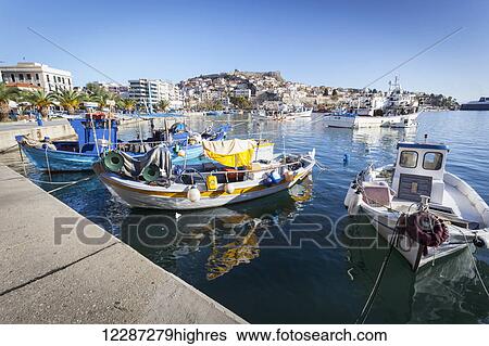 Boats in the harbour and view of the coastline; Kavala, Greece View Large Photo Image Stock Photograph - Boats in the harbour and view of the coastline; Kavala, Greece. Fotosearch