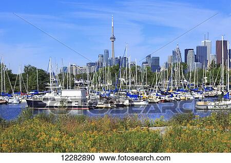 Boats in the harbour at Leslie Spit; Toronto, Ontario, Canada View Large Photo Image Stock Image - Boats in the harbour at Leslie Spit; Toronto, Ontario, Canada. Fotosearch