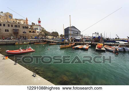 Boats in the turquoise water in the harbour; Joppa, Israel View Large Photo Image Stock Photograph - Boats in the turquoise water in the harbour; Joppa, Israel. Fotosearch