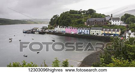 Boats moored in the tranquil harbour along Skye Island; Portree, Scotland View Large Photo Image Stock Photograph - Boats moored in the tranquil harbour along Skye Island; Portree, Scotland. Fotosearch
