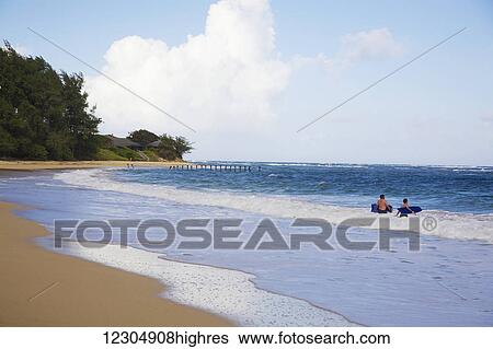 Boogie boarders enjoying the waves at Laie Beach Park on the north shore of Oahu; Oahu, Hawaii, United States of America View Large Photo Image Stock Photograph - Boogie boarders enjoying the waves at Laie Beach Park on the north shore of Oahu; Oahu, Hawaii, United States of America. Fotosearch