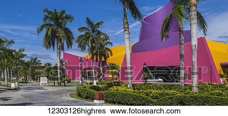 Bright and colourful buildings at a convention centre in the Caribbean; Playa del Carmen, Quintana Roo, Mexico View Large Photo Image Stock Photograph - Bright and colourful buildings at a convention centre in the Caribbean; Playa del Carmen, Quintana Roo, Mexico. Fotosearch