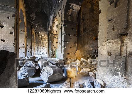 Broken pillars and walls, interior of the Colosseum; Rome, Italy View Large Photo Image Stock Photograph - Broken pillars and walls, interior of the Colosseum; Rome, Italy. Fotosearch