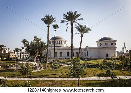 Stock Photograph - Building with domes and palm trees; Jericho, Israel. Fotosearch
