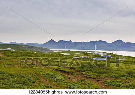 Buildings and street lights of Sand Point with King Cove and Unga Island Mountains in the background, Southwestern Alaska, USA, Summer View Large Photo Image Stock Photograph - Buildings and street lights of Sand Point with King Cove and Unga Island Mountains in the background, Southwestern Alaska, USA, Summer. Fotosearch