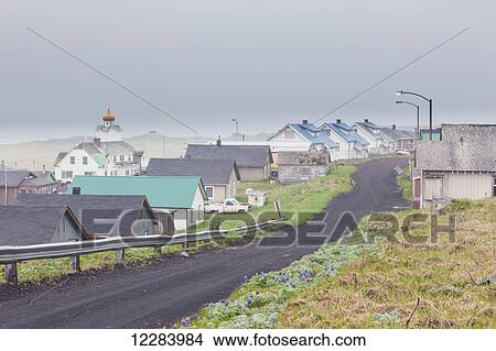 Buildings on the edge of St. Paul, St. Paul Island, Southwestern Alaska, USA, Summer View Large Photo Image Picture - Buildings on the edge of St. Paul, St. Paul Island, Southwestern Alaska, USA, Summer. Fotosearch
